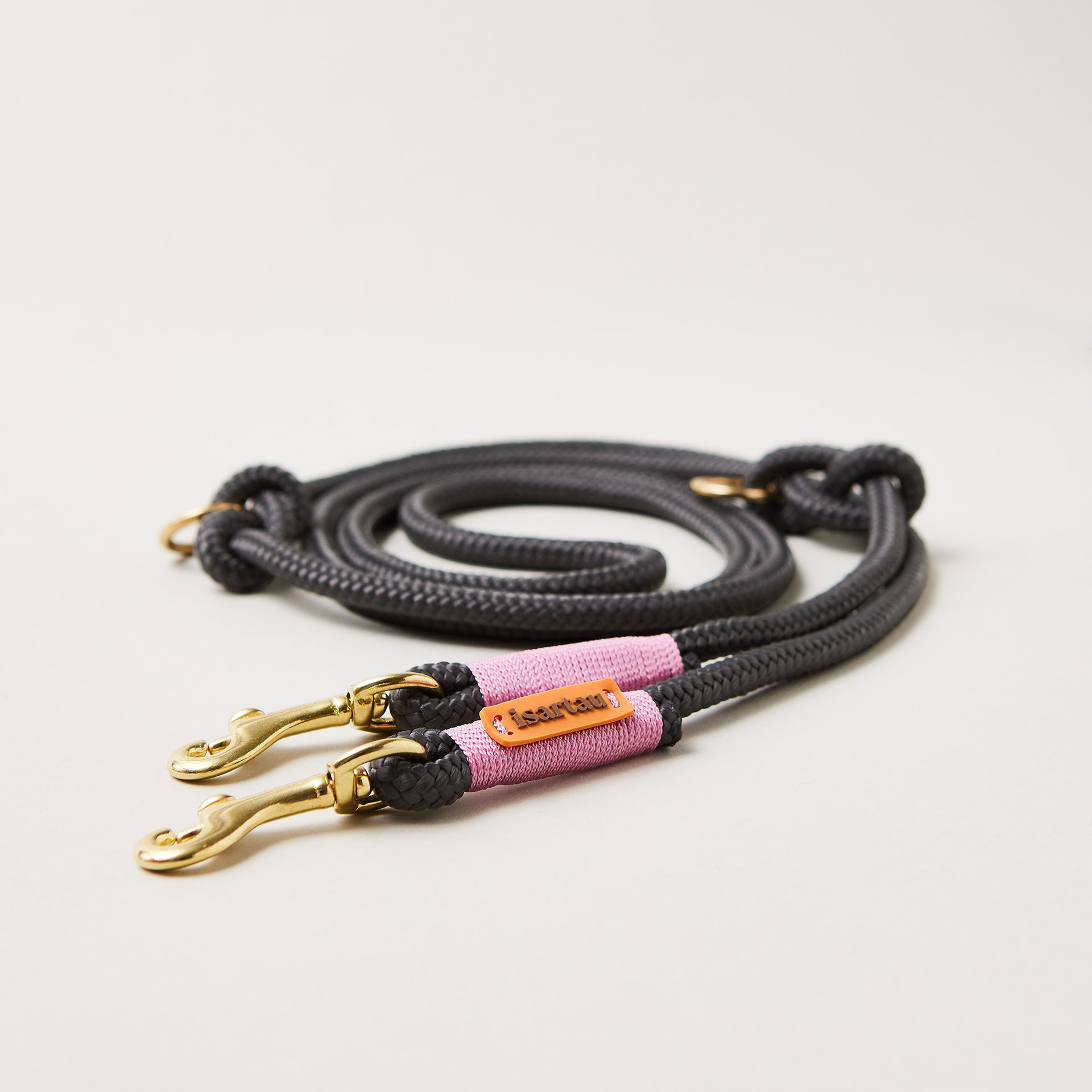 Tauleine Heavens Rock 8 mm verstellbar mit leichten Messing-Karabinern, dunkelgraues Tau mit rosafarbener Takelung, Längenverstellbar über Knoten