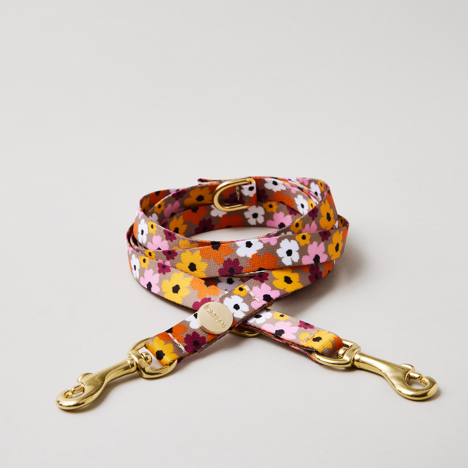 Verstellbare Hundeleine „Blumenmeer“, 15 mm breites Gurtband mit Blumenmotiv, goldfarbene Mini-Karabiner.