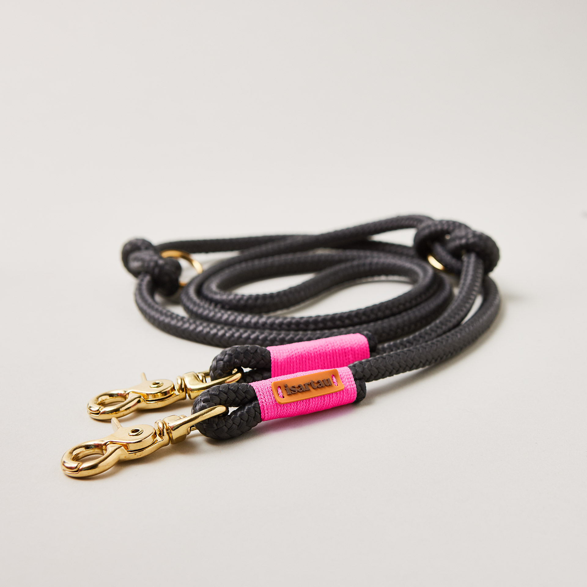 Hundeleine aus Tau Heavens Rock Neonpink 10 mm verstellbar mit Messing-Karabinern, dunkelgraues Tau mit pinker Takelung, Längenverstellbar über Knoten