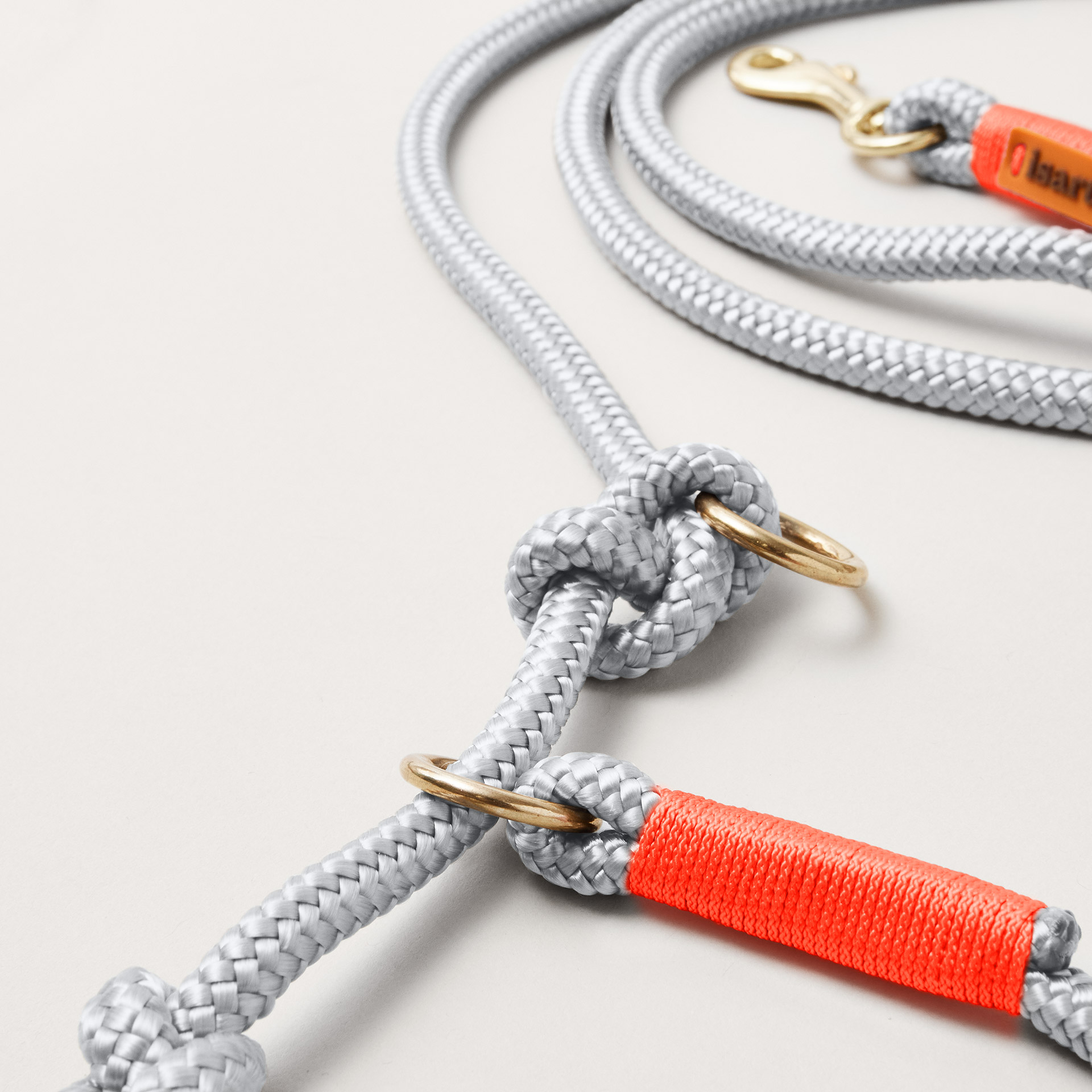 Detail Tau Retrieverleine Pebble Stone Neonorange mit verstellbaren Knoten, Farben Hellgrau und Neonorange