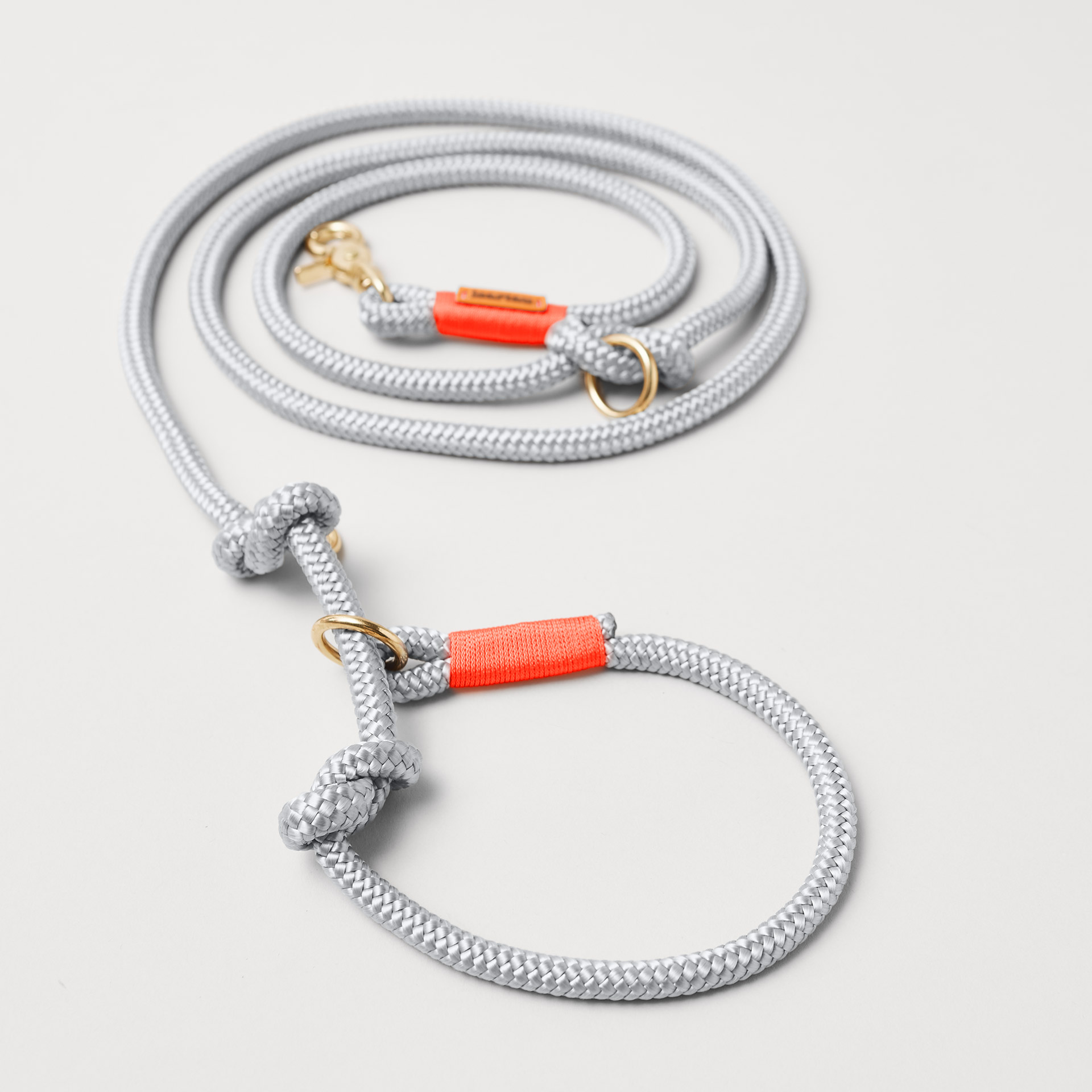 Retrieverleine Pebble Stone Neonorange, Halsung mit integrierter Leine, goldene Messingkarabiner, 2-fach längenverstellbar, 10mm